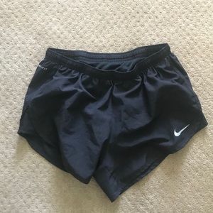 Black Nike running shorts